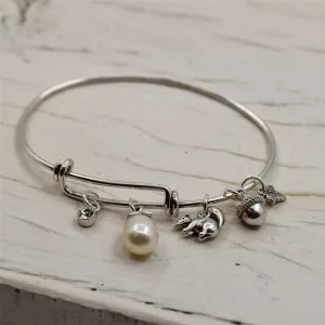 Adjustable bangle with sweet woodland charms