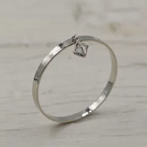 Delicate full bangle with caged crystal dropper
