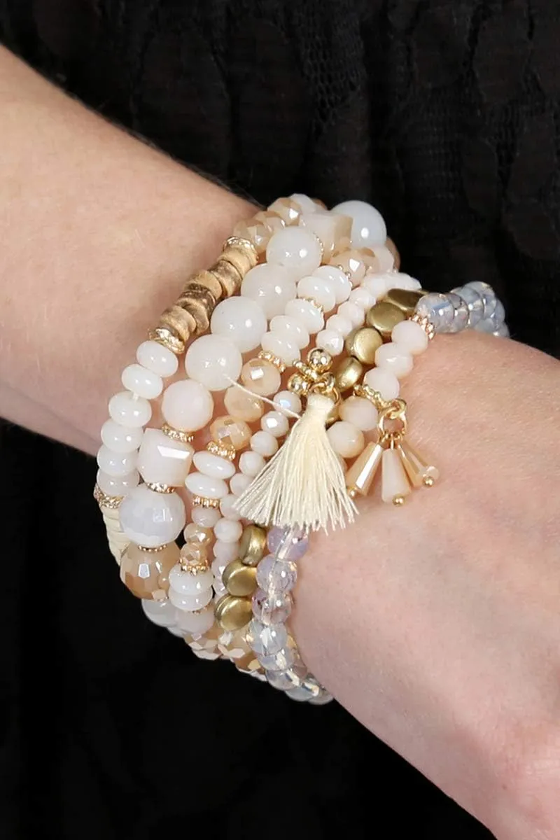 RIAH FASHION Multi Layer Versatile Statement Bracelets - Stackable Beaded Strand Stretch Bangles Sparkly Crystal, Wood Bead, Tassel Charm Pendant